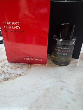 Frederic Malle Portrait of a Lady - Red & Black Packaging used approx half left
